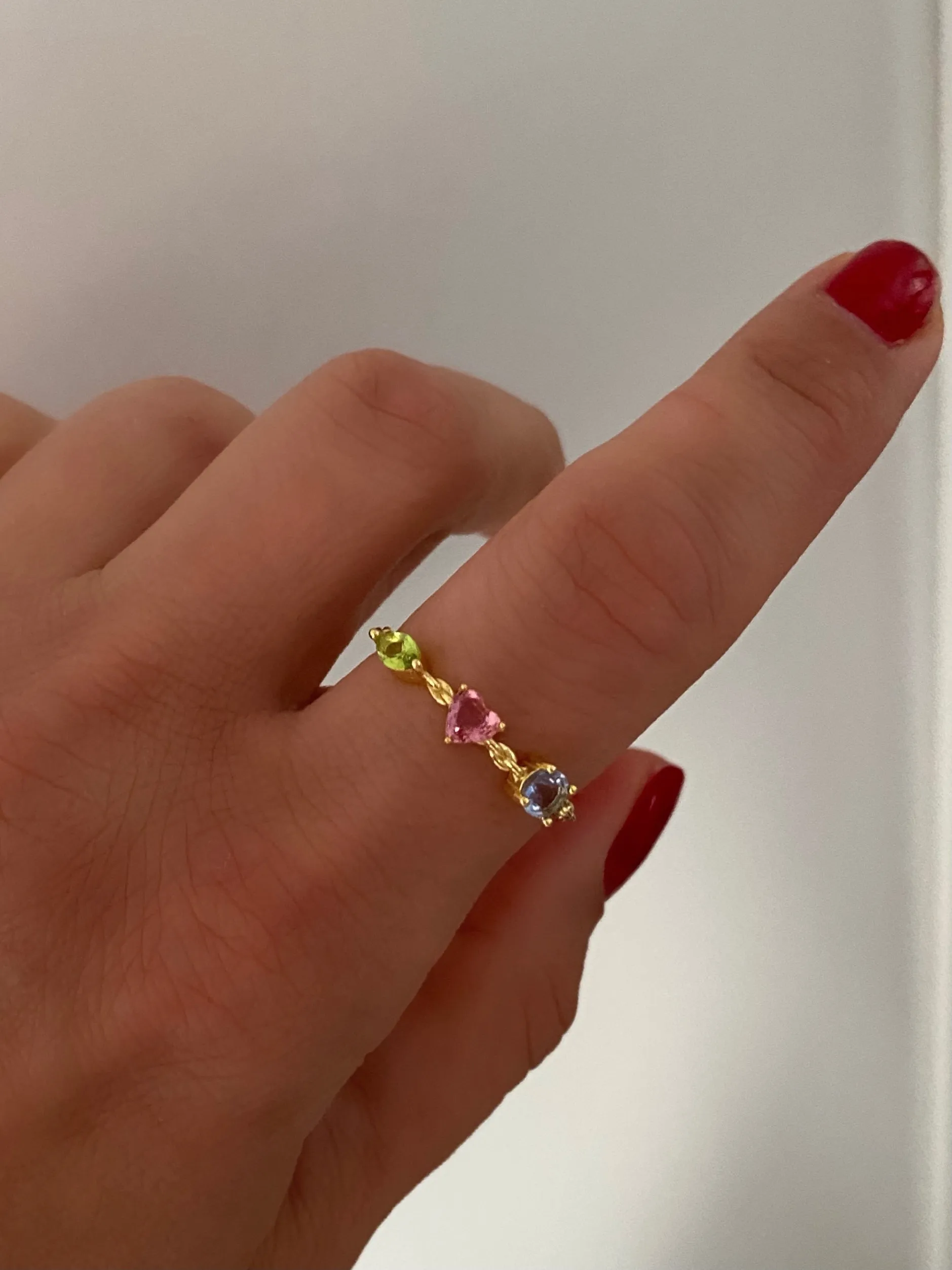 Ring with pink heart and Blue and green stones